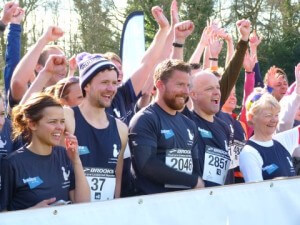 Dave Summersgill (centre) who ran for Bates Solicitors in 2015 in a pre-run photocall