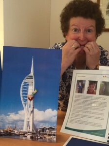 Image of the Spinnaker Tower with toy lady suspending mid descent created to inspire Doreen.